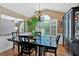 Bright dining area featuring natural light, hardwood floors, and elegant furnishings at 1331 Red Hill Rd, Marietta, GA 30008