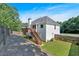 Exterior view of house with green grass and cloudy sky at 1331 Red Hill Rd, Marietta, GA 30008