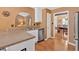 Well-lit kitchen with stainless steel appliances, adjacent dining area, and open layout at 1331 Red Hill Rd, Marietta, GA 30008
