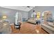 Inviting living room with hardwood floors, neutral walls, comfortable seating, and arched entryways at 1331 Red Hill Rd, Marietta, GA 30008