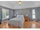 Spacious main bedroom with tray ceilings, large windows, and natural light at 1331 Red Hill Rd, Marietta, GA 30008