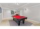 Finished basement featuring a pool table and neutral colors at 3560 Greenside Ct, Dacula, GA 30019