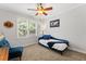 Cozy bedroom with natural light and soothing decor, creating a comfortable and inviting space at 3560 Greenside Ct, Dacula, GA 30019
