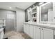 Bright bathroom featuring double sinks, large mirror, and a separate shower at 55 Forest Rd, Stockbridge, GA 30281