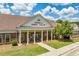 View of Cochran Public Library featuring a brick facade, columned entrance, and landscaped front yard at 55 Forest Rd, Stockbridge, GA 30281