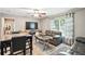 Comfortable living room area with TV, seating, and dining setup at 55 Forest Rd, Stockbridge, GA 30281