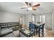 Cozy living room with leather sofas, dining table and modern decor at 55 Forest Rd, Stockbridge, GA 30281