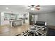Open floor plan with kitchen island, and living area, great for entertaining at 55 Forest Rd, Stockbridge, GA 30281