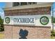 City of Stockbridge brick entrance sign with logo and established date of 1920 at 55 Forest Rd, Stockbridge, GA 30281