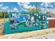 A vibrant Stockbridge mural showcasing community spirit, and colorful artwork promoting local identity and culture at 55 Forest Rd, Stockbridge, GA 30281