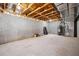 Unfinished basement with exposed utilities and concrete foundation, ready for customization at 917 Saints Ct, Marietta, GA 30068