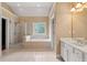 Bright bathroom with a large shower, separate tub, and double sink vanity at 917 Saints Ct, Marietta, GA 30068