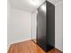 A spacious walk-in closet boasts hardwood floors and modern sliding doors at 917 Saints Ct, Marietta, GA 30068