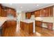 Gourmet kitchen with custom cabinets, stainless steel appliances, and an island with counter seating at 917 Saints Ct, Marietta, GA 30068