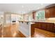 Kitchen and living area with open floor plan, stainless appliances, island and plenty of space at 917 Saints Ct, Marietta, GA 30068