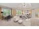 Bedroom suite with tray ceiling, office nook, and access to bathroom at 917 Saints Ct, Marietta, GA 30068