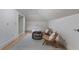 Bright bonus room offers seating, a work desk, and hardwood floors at 1066 High Point Dr, Atlanta, GA 30306