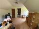 A functional attic space with a unique ceiling design and storage potential at 3398 Highway 81, Oxford, GA 30054