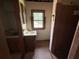 An interior bathroom with a walk-in shower and a small window at 3398 Highway 81, Oxford, GA 30054