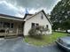 Well-maintained home with updated siding, a garden, and a convenient back porch area at 3398 Highway 81, Oxford, GA 30054