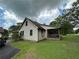 Well-maintained home with updated siding, a garden, and a convenient back porch area at 3398 Highway 81, Oxford, GA 30054