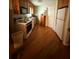 Functional kitchen featuring wood cabinets, modern appliances, and hardwood flooring at 3398 Highway 81, Oxford, GA 30054