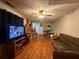 Spacious living room with hardwood floors and a ceiling fan at 3398 Highway 81, Oxford, GA 30054
