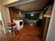 A spacious living room features hardwood floors, a washer and dryer, and a cozy atmosphere at 3398 Highway 81, Oxford, GA 30054