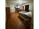 Spacious main bedroom features natural lighting, hardwood floors, and an ample closet at 3398 Highway 81, Oxford, GA 30054