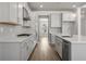 Stylish kitchen featuring quartz countertops, stainless steel appliances, and plenty of storage at 5325 Trescott Path, Cumming, GA 30028