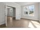Bright office space featuring natural light from large windows and stylish French doors at 5325 Trescott Path, Cumming, GA 30028