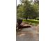 Beautifully maintained yard with landscaping, mulch and mature trees for shade at 5904 Clairmont Way, Powder Springs, GA 30127