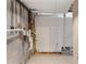 Unfinished basement space showing concrete walls and tile flooring at 9491 Hidden Branch Dr, Jonesboro, GA 30236