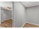 This bedroom features wood-look floors, base molding and neutral paint at 9491 Hidden Branch Dr, Jonesboro, GA 30236