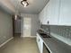 An eat-in kitchen featuring stainless steel appliances and granite countertops at 9491 Hidden Branch Dr, Jonesboro, GA 30236