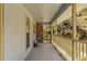 Charming covered porch, ideal for relaxing and enjoying the outdoors at 9491 Hidden Branch Dr, Jonesboro, GA 30236