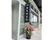 Close up of a sushi restaurant exterior with a tile wall and flower pot at 140 Rolison Way, Fayetteville, GA 30214