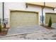 Double garage with minimalist style with black fixtures at 140 Rolison Way, Fayetteville, GA 30214