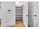 Spacious pantry with ample shelving for organized food storage at 140 Rolison Way, Fayetteville, GA 30214
