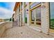 Brick-paved outdoor patio with a view and stylish building exterior at 140 Rolison Way, Fayetteville, GA 30214