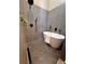 Modern bathroom showcasing a freestanding tub and hexagon tile floors at 1400 Peter Haughton Nw Way, Atlanta, GA 30318