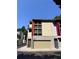 View of the townhome featuring a garage and abundant windows at 1400 Peter Haughton Nw Way, Atlanta, GA 30318