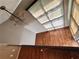 Living room with hardwood floors, chandelier and skylights at 1400 Peter Haughton Nw Way, Atlanta, GA 30318