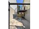 View of the patio with a spiral staircase and fence at 1400 Peter Haughton Nw Way, Atlanta, GA 30318