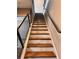 View of wooden stairs with a metal railing at 1400 Peter Haughton Nw Way, Atlanta, GA 30318