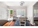 Cozy breakfast nook with natural light, views of the backyard, and access to the deck at 1811 Ascot Nw Cv, Acworth, GA 30102