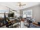 This home office is equipped with multiple desks and a ceiling fan at 1811 Ascot Nw Cv, Acworth, GA 30102
