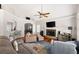 Inviting living room with a fireplace, vaulted ceilings, and hardwood floors for relaxed living at 1811 Ascot Nw Cv, Acworth, GA 30102