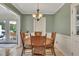 Bright dining area with a table, chairs and view to the backyard at 6380 Concord Rd, Cumming, GA 30028