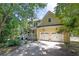 Charming two-story home with a two car garage and beautiful landscaped front yard at 6380 Concord Rd, Cumming, GA 30028